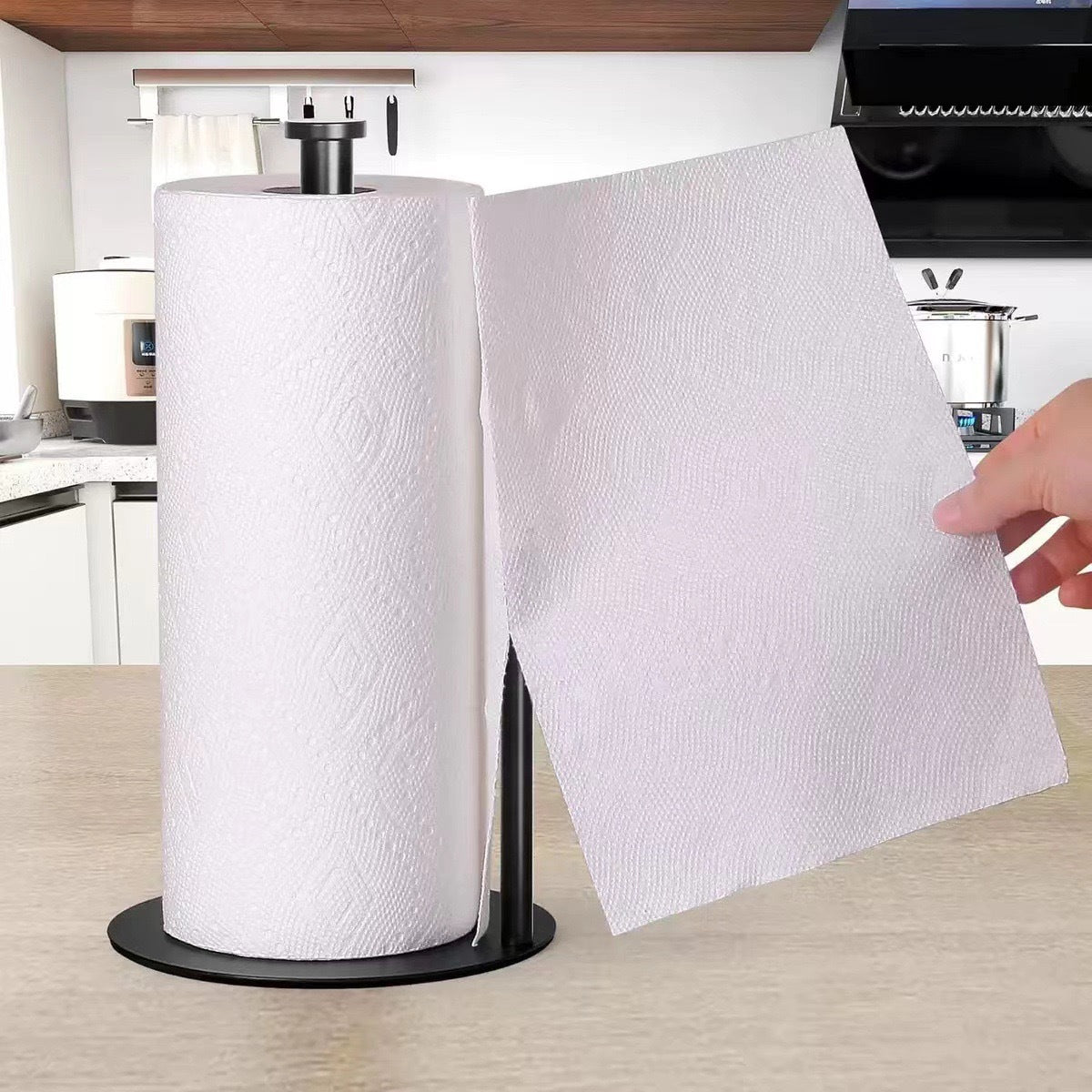 Black countertop holder shown with a paper towel roll